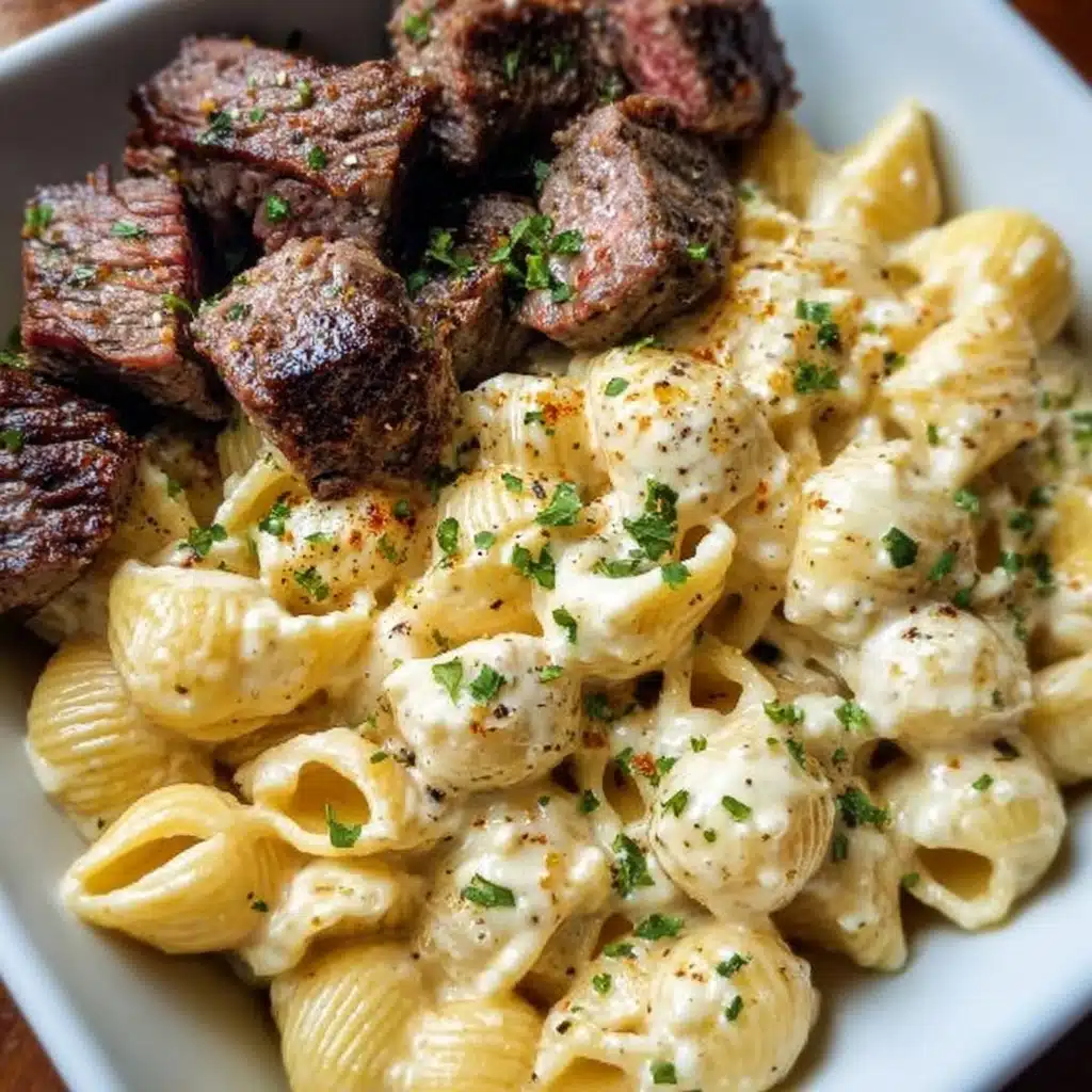 Steak Bites and Shell Pasta in Garlic Butter Alfredo Sauce Recipe - Recipe Image